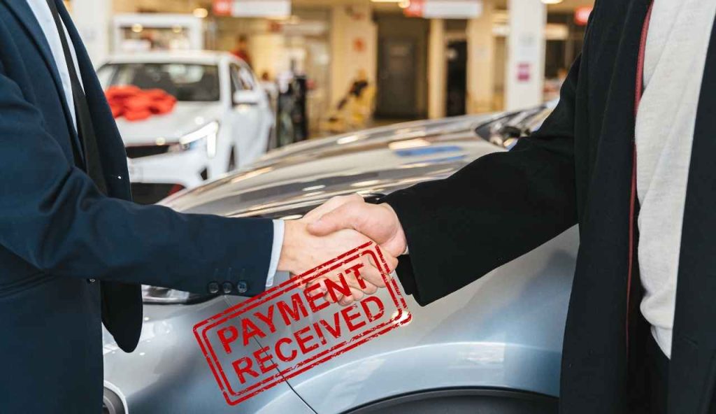Auto pagata in concessionaria